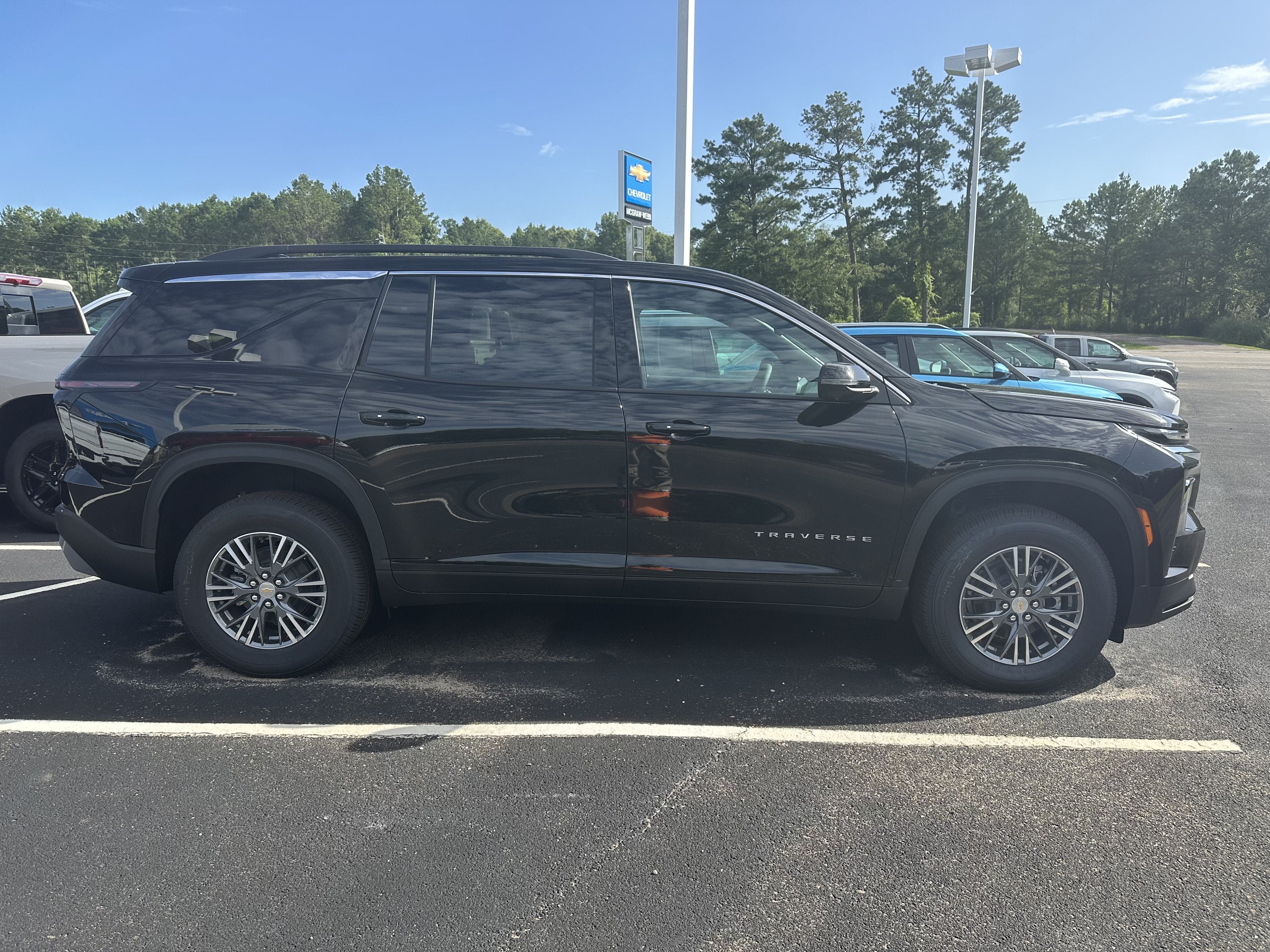 2026 Chevrolet Traverse LT in Mosaic Black Metallic — front three-quarter view