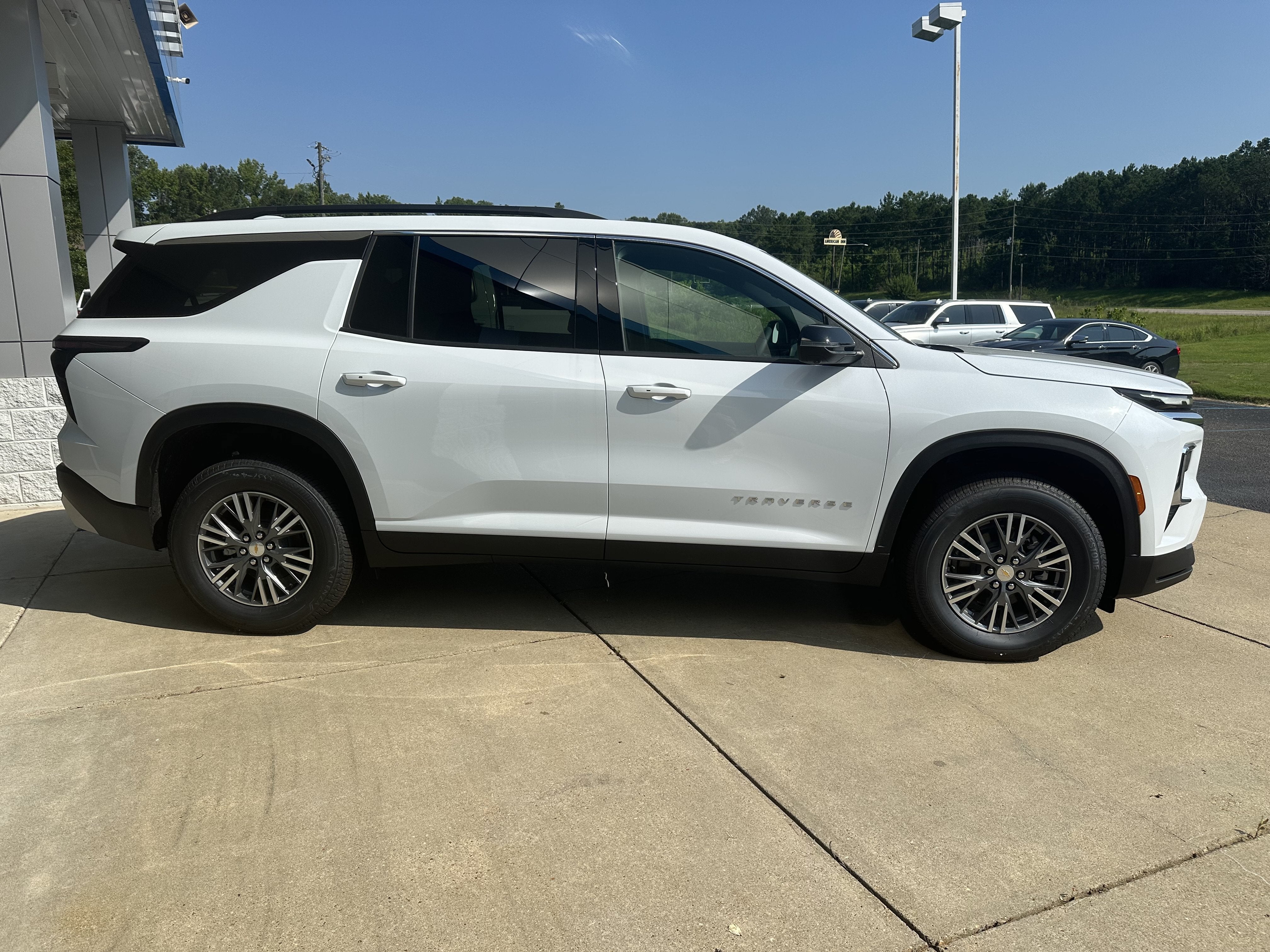 2026 Chevrolet Traverse LT in Polar White Tricoat — front three-quarter view