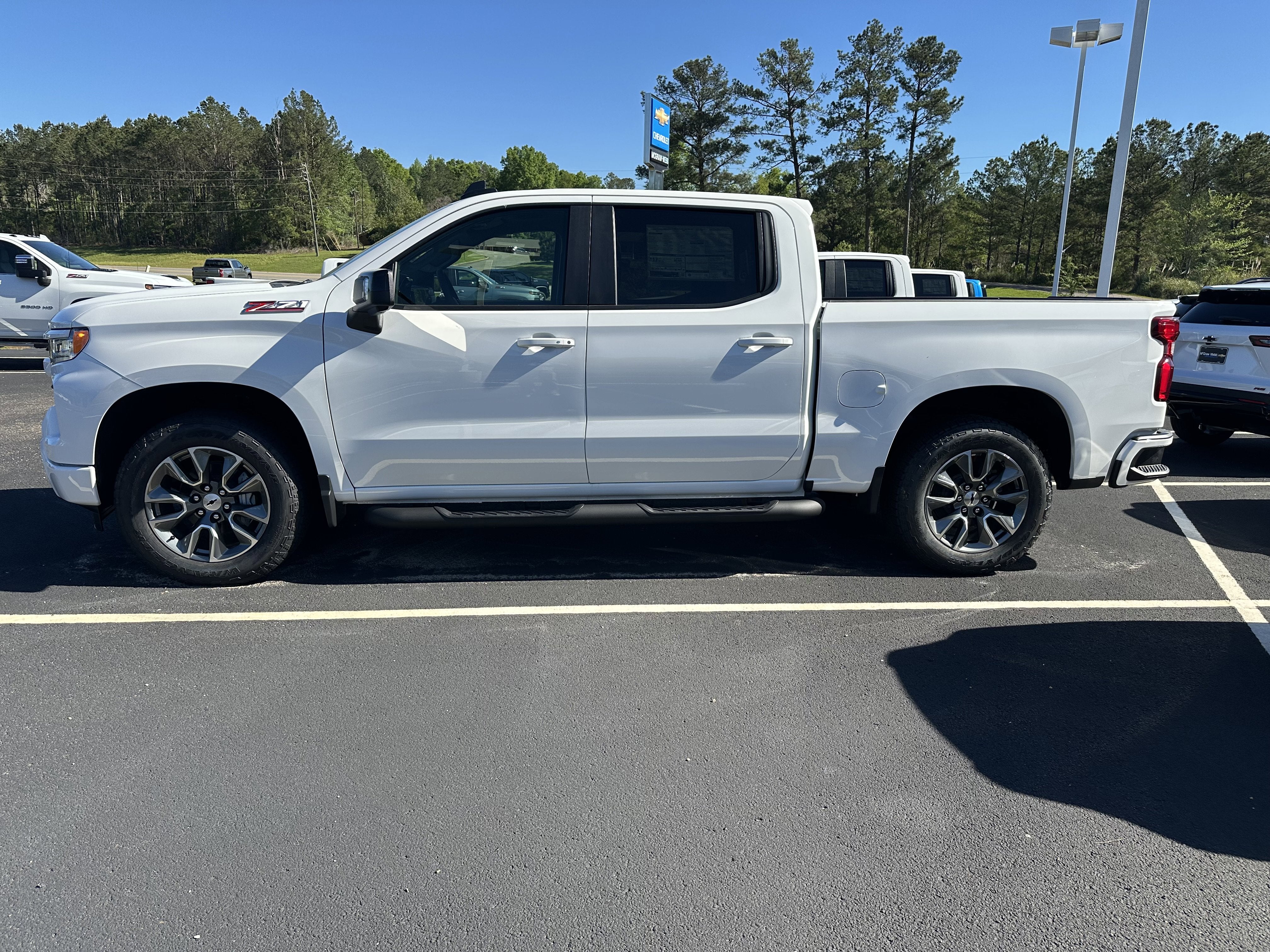 2026 Chevrolet Silverado 1500 RST in Summit White — front three-quarter view