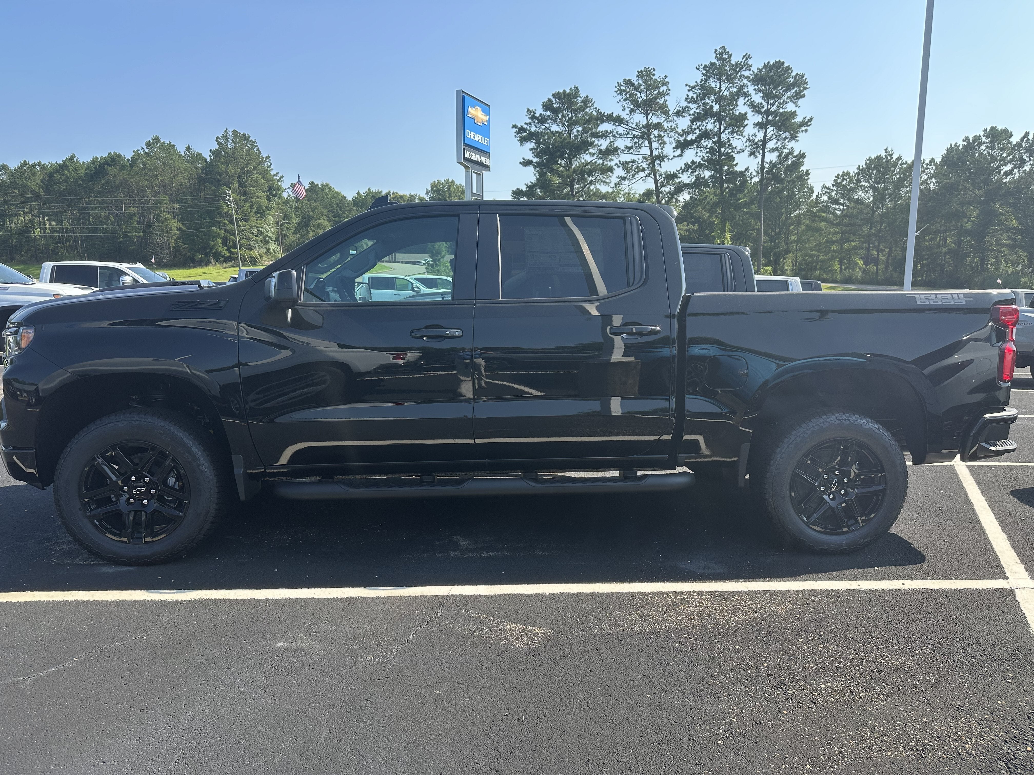 2026 Chevrolet Silverado 1500 LT Trail Boss in Black — front three-quarter view